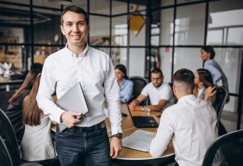 Group of people working out business plan in an office